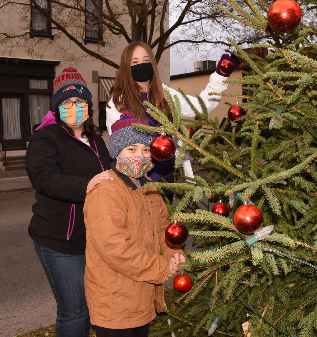 Teachers decorate trees