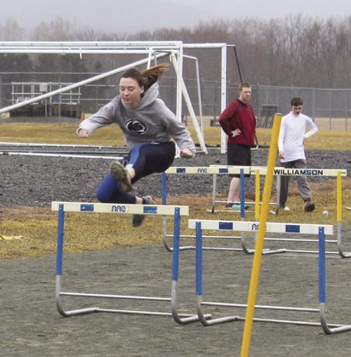 Delaney Doan practices hurdles