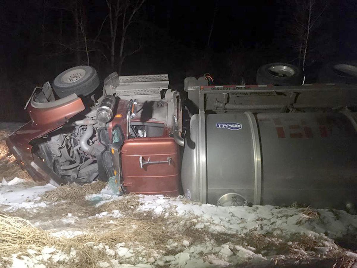 Tanker truck rolls over