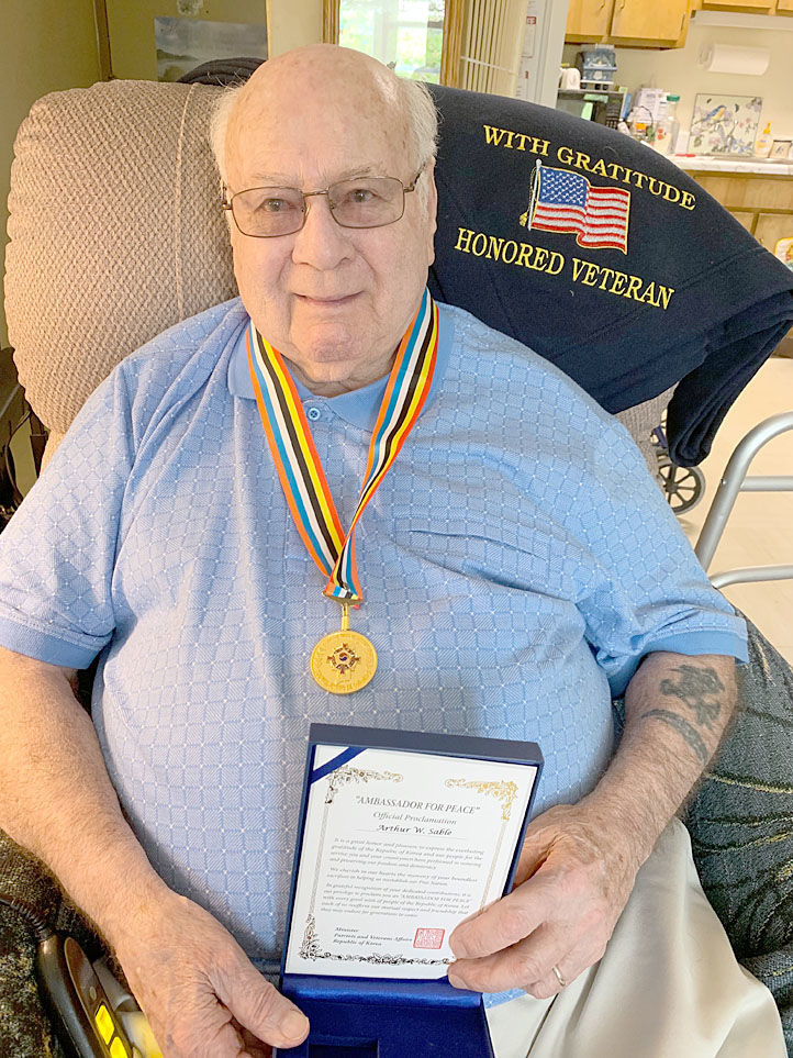 Sable receives the Ambassador of Peace medal