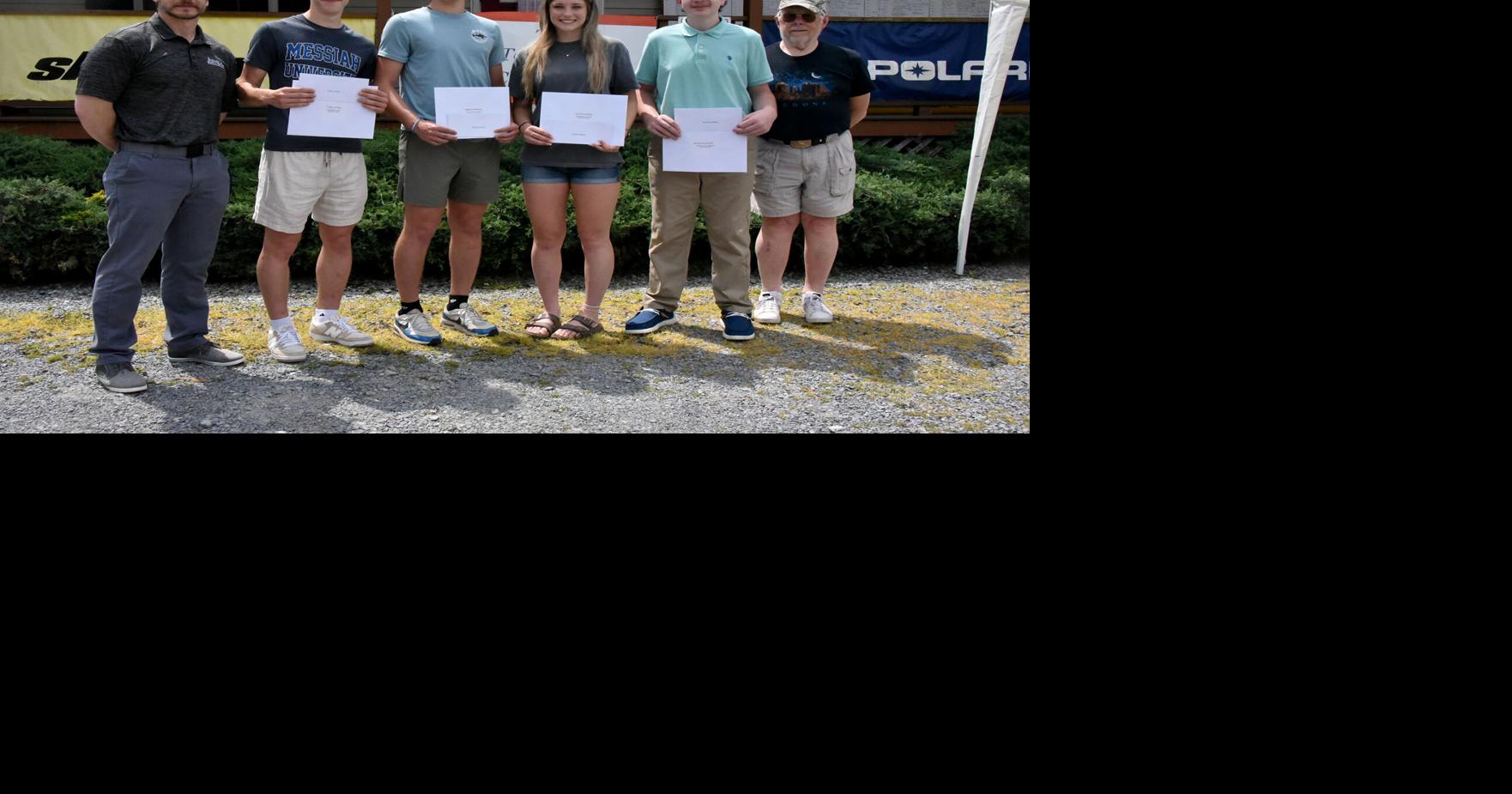 Snowmobile club, partners award four scholarships