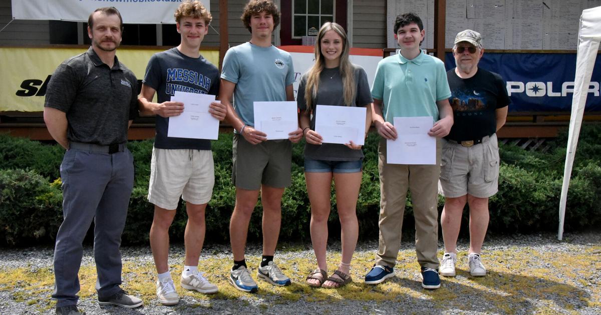Snowmobile club, partners award four scholarships
