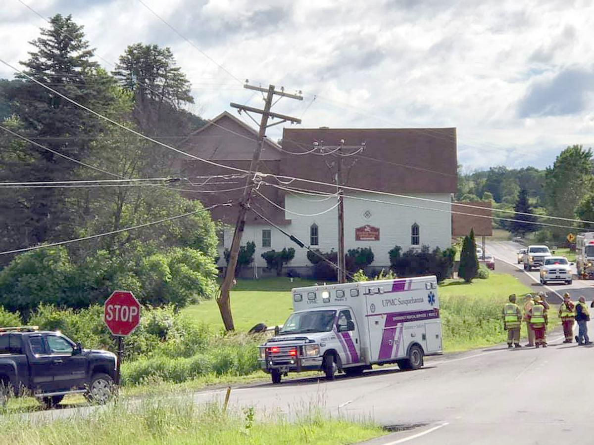Two-vehicle crash involves utility pole