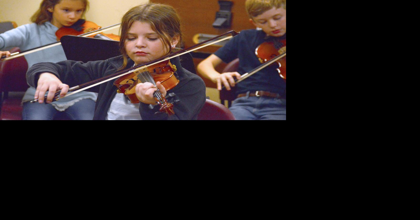 Tickling the strings: Program draws old and new hands