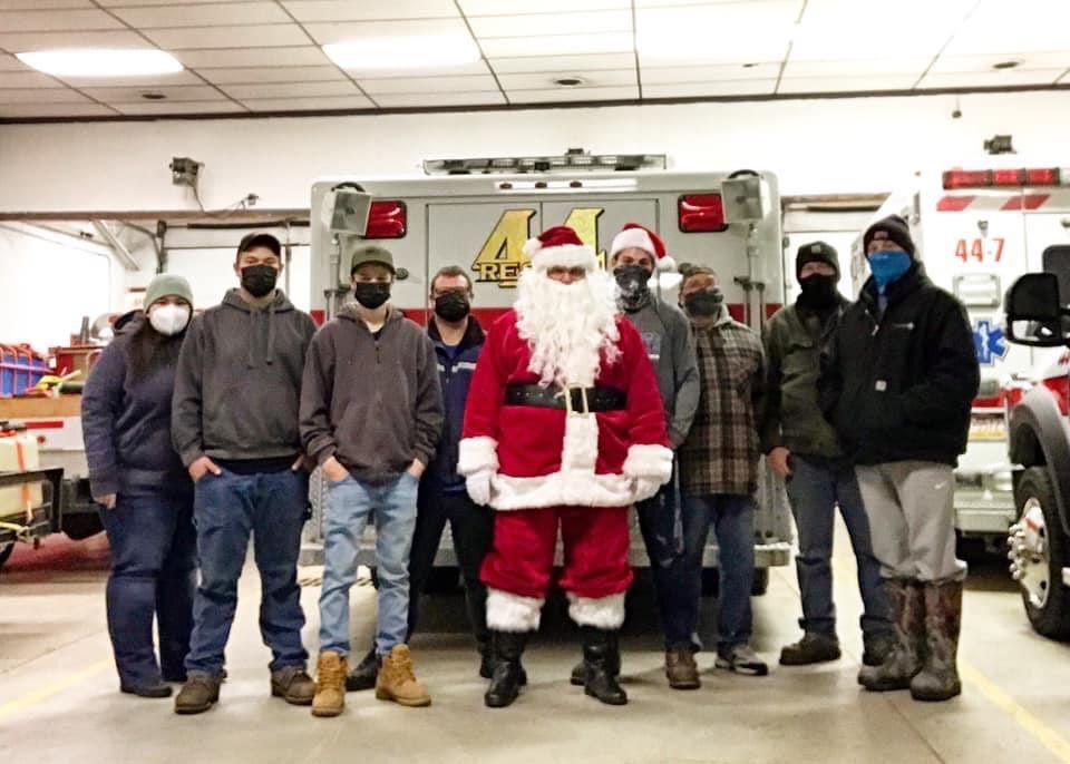 Santa visits on fire truck