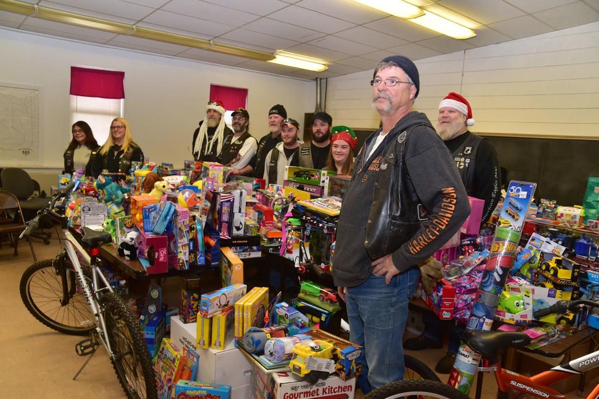 Motorcycle club donates children's gifts