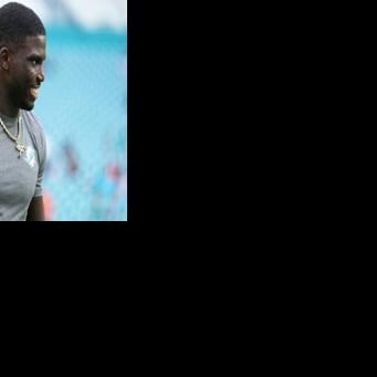 Miami Dolphins wide receiver Tyreek Hill warms up before an NFL pre-season game