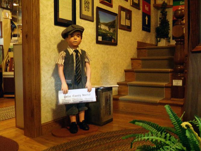 Newsboy welcomes visitors to Historical Society