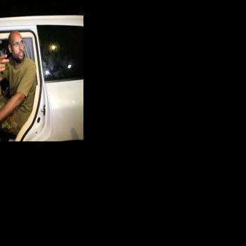 Who is behind the killing of late ruler Gaddafi's son, and why now?