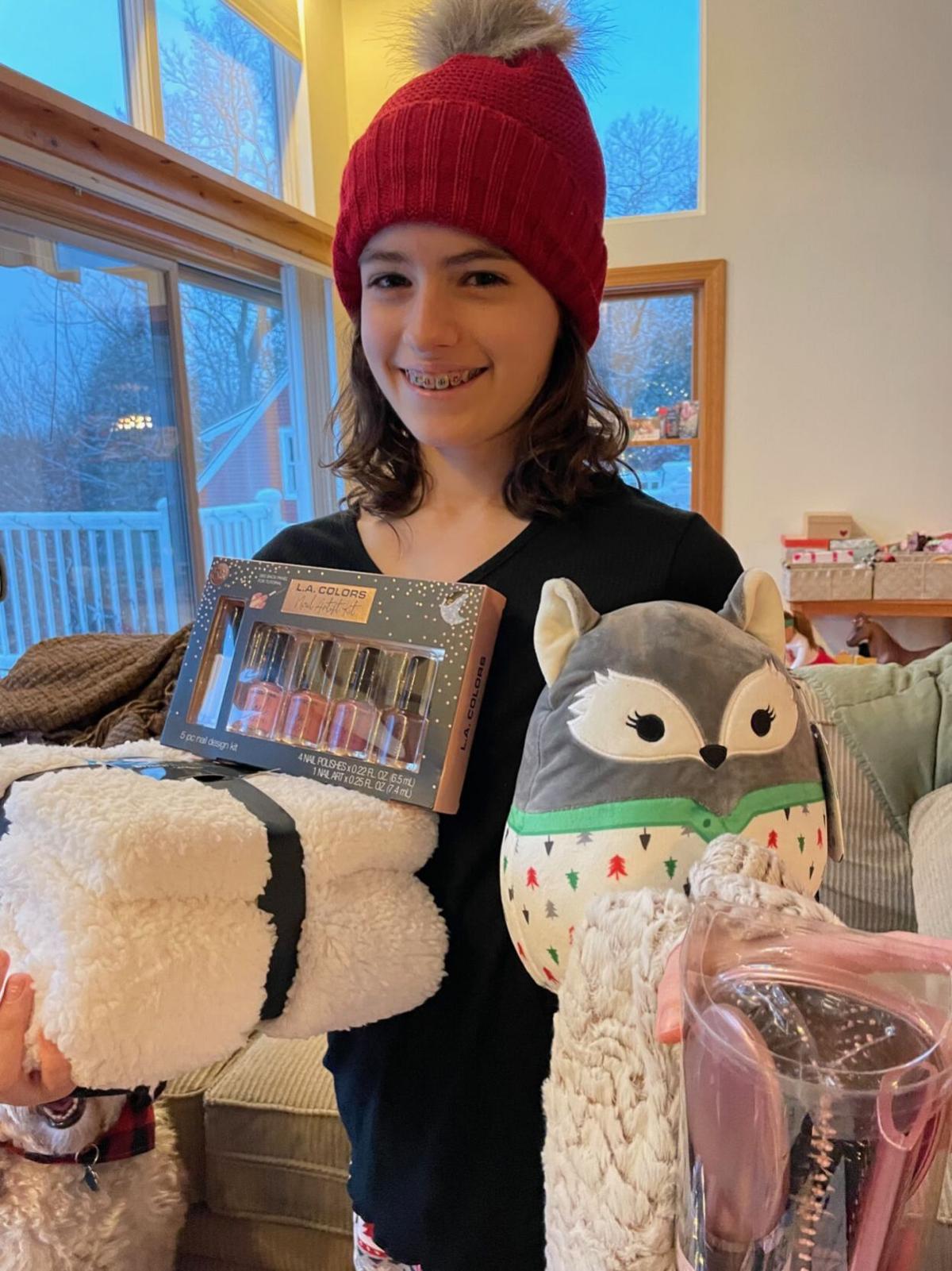 Coloring page winner receives gifts