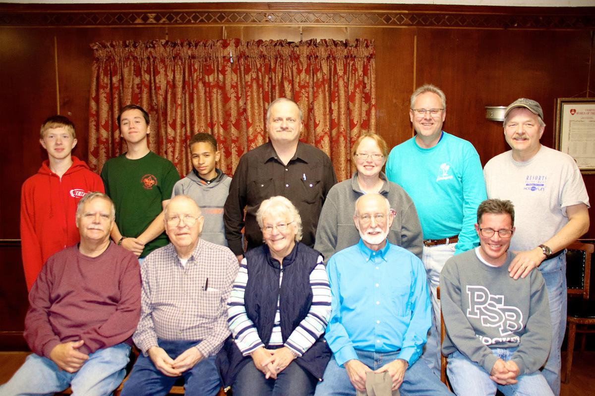 Rotarians clean up roadway