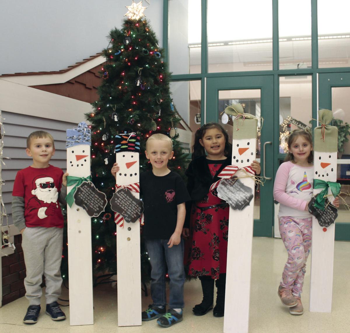 Snowmen made to resemble students