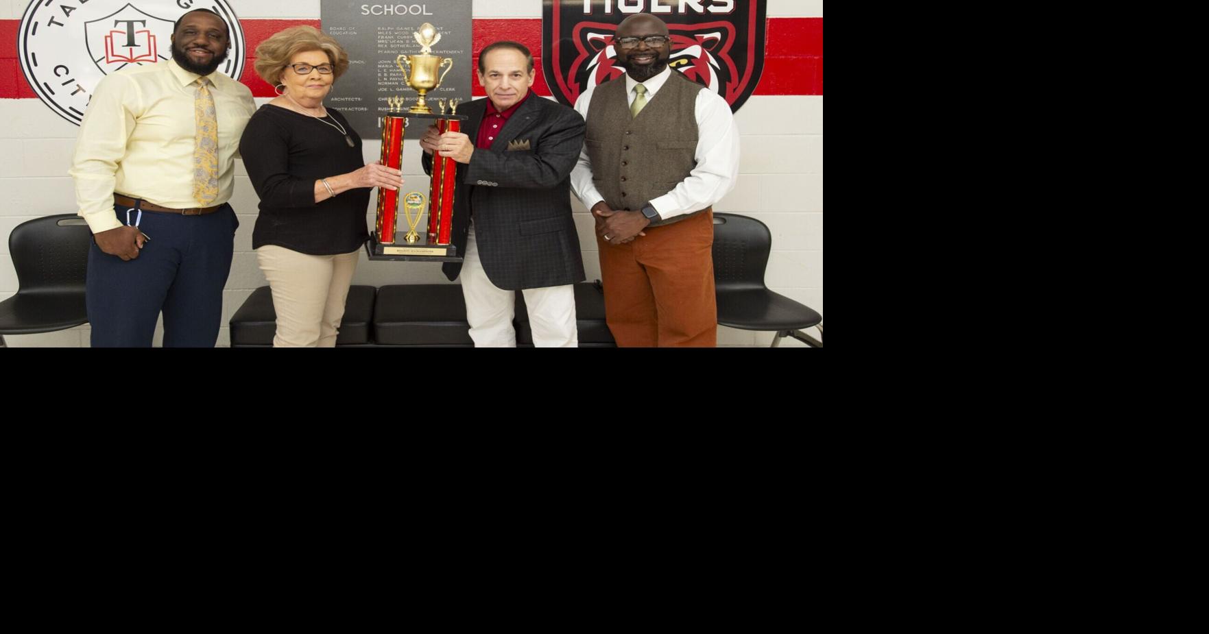 Trophy life Symbol of '75 success given secure home at high school