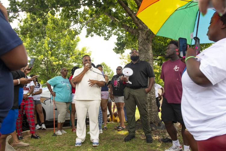 PHOTOS: Residents gather for murder victim and justice