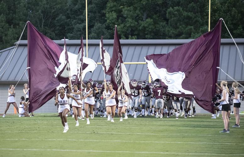 PHOTOS: Ben Russell hosts Huffman in the first game of the season