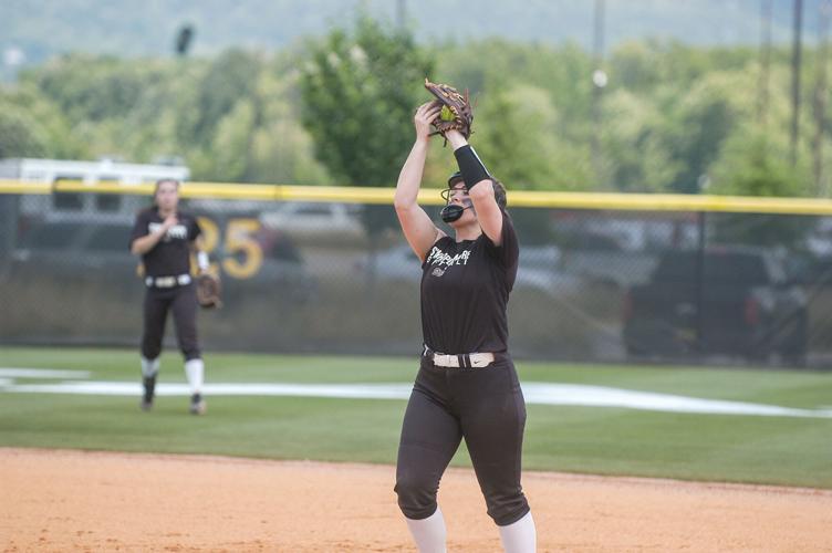 PHOTOS: Area teams play in regional softball tourney