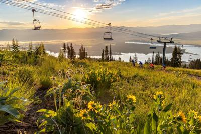 The Tamarack Express chairlift overlooks a stunning Lake Cascade.