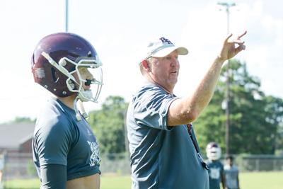 LIKE FATHER, LIKE SON: Smiths learn to overcome obstacles through football