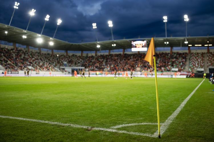 corner of football pitch at the stadium during the match by Dziurek