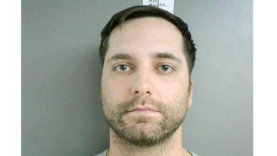 Burkhalter indicted on charges related to relationship with student