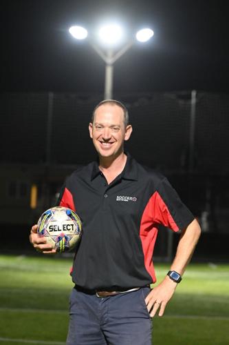 Owner of Soccer 5 Bayonne, James Gould, stands ready to kick off high-energy small-sided soccer in the community.