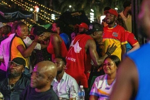 Congolese supporters in Kinshasa watch a broadcast of the match
