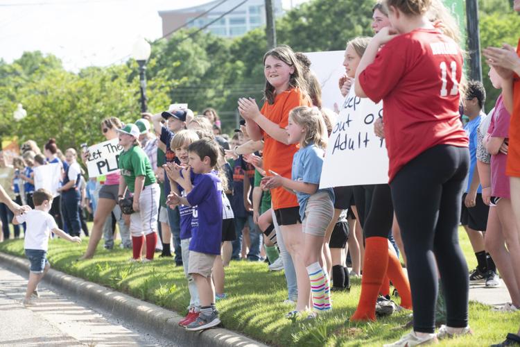 PHOTOS: Children, parents protest for kids to play ball