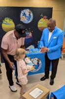 Former baseball and football star Brian Jordan and Aflac President Virgil Miller join forces to show love and care to children and families at SSM Health Cardinal Glennon Children's Hospital in St. Louis
