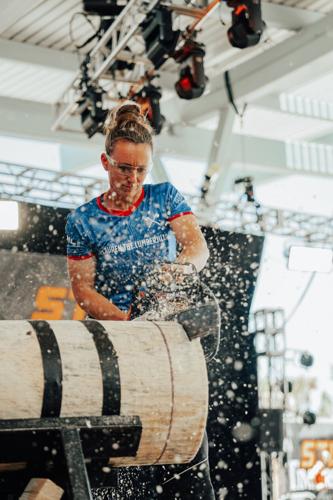 Lauren Bergman, the inaugural STIHL TIMBERSPORTS® North American Women's Cup champion, competes in the Stock Saw discipline during competition.