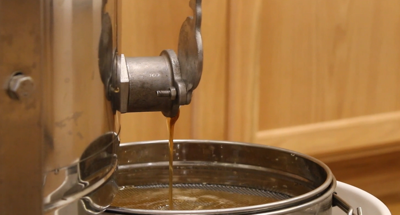 Beekeepers showcase the honey harvesting process