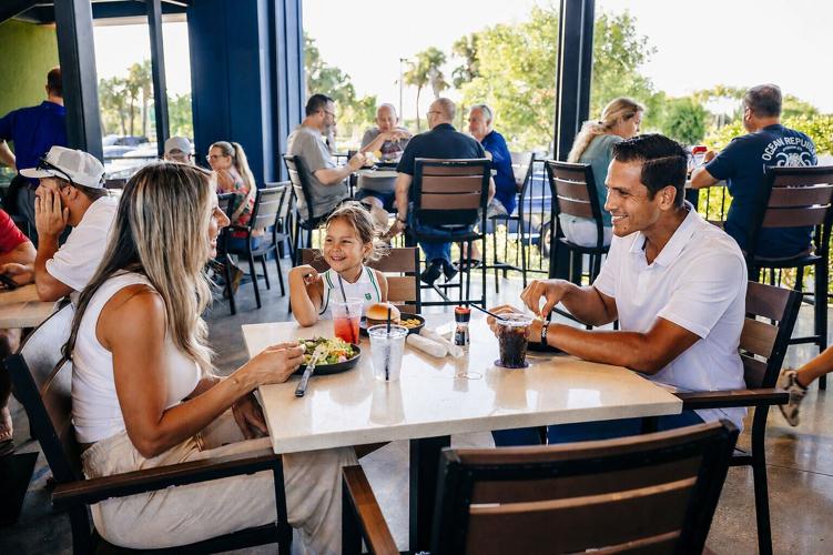 Family eating at PopStroke