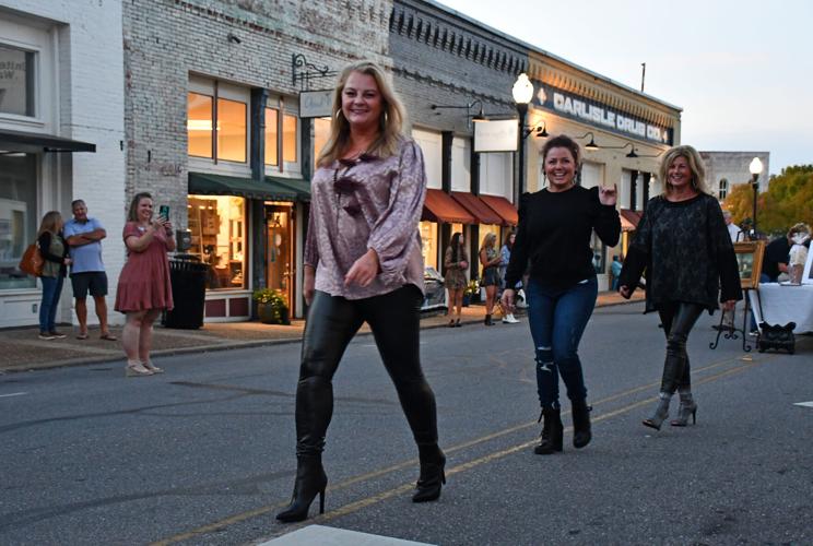 PHOTOS: Models strut down Main Street at 'Sip, Shop and Support'