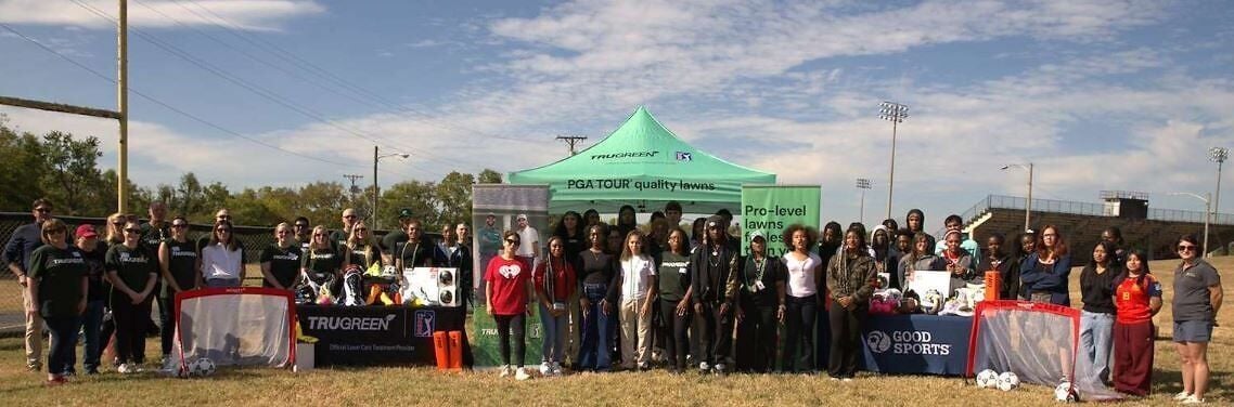 Representatives from TruGreen, iHeart and Good Sports gathered with Maplewood High students to present new sports equipment.