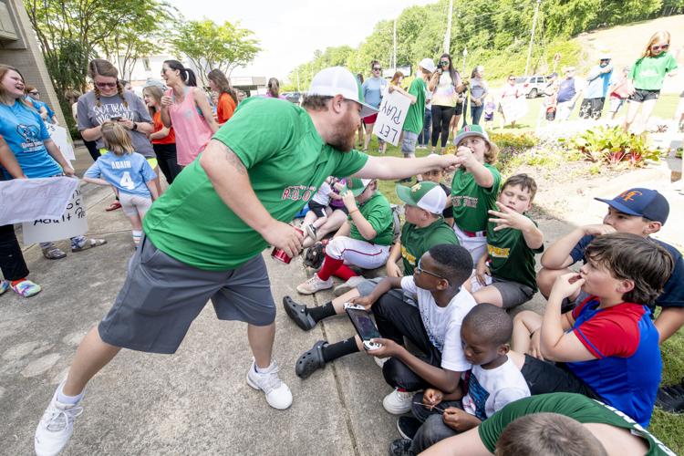 PHOTOS: Children, parents protest for kids to play ball