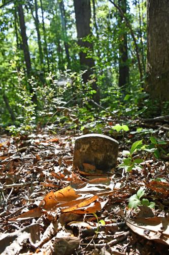 PHOTOS: Dozens of old Youngsville graves lie in the woods of the Russell Mills estate