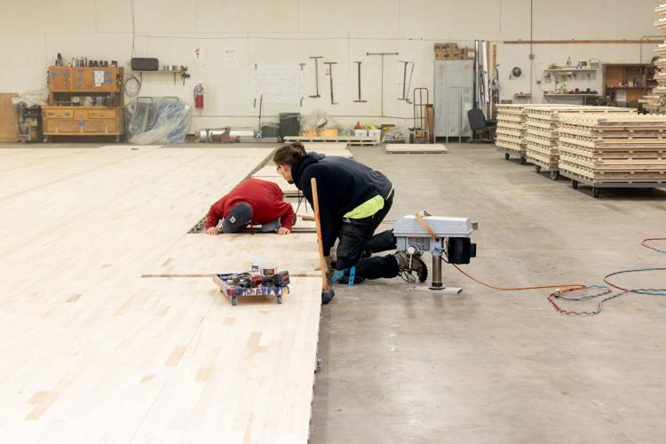 Robbins manufacturing team assembles All-Star Portable flooring with precision engineering and quality craftsmanship (PRNewsfoto/Robbins Sports Surfaces)