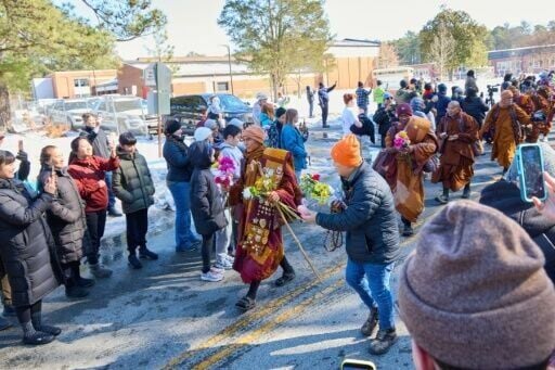 Americans have been captivated by a band of Buddhist monks who are on a mission to spread compassion, unity, and non-violence on their 'Walk for Peace,' a 2,300 mile trek from Texas to the US capital Washington