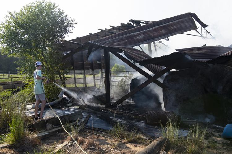 PHOTOS: Hay barn fire at Bar J Farms