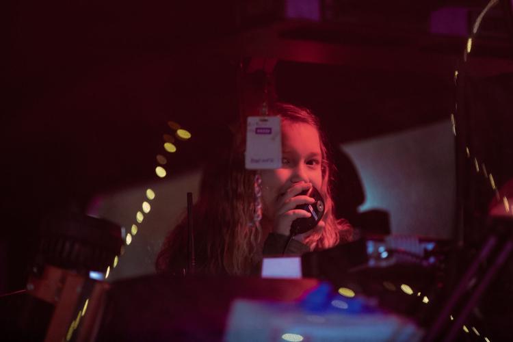 Fourth grader sings in Christmas parade