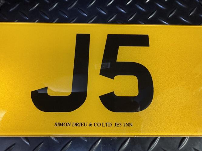 A number plate has sold for 350K – but legally has to come with a broken scooter