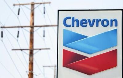US energy giant Chevron said a tropical cyclone had caused production outages at two major LNG plants in Western Australia.