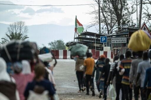 Displaced Burundian nationals attempt to return home following the closure of the border between the Democratic Republic of Congo and Burundi at the Kavimvira checkpoint