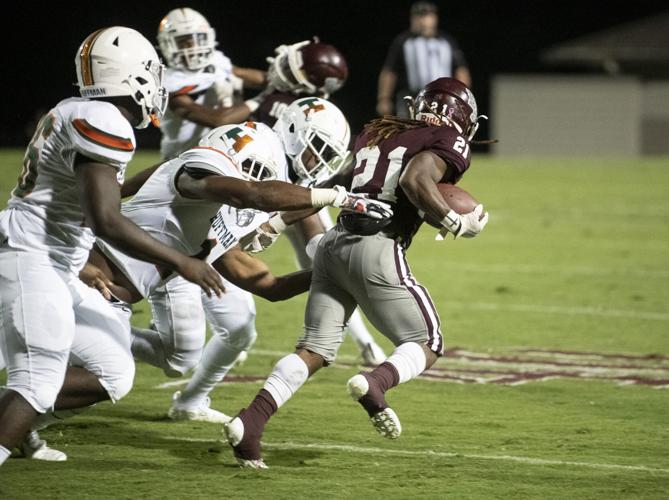 PHOTOS: Ben Russell hosts Huffman in the first game of the season