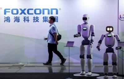 Strong demand for AI hardware brought a 24 percent annual net profit jump last year for Foxconn