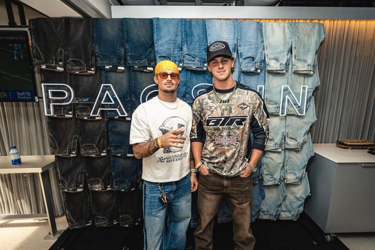 Caleb McDaniel and Nathan Rednowers celebrate seven years of partnership between Pacsun and the Los Angeles Rams.