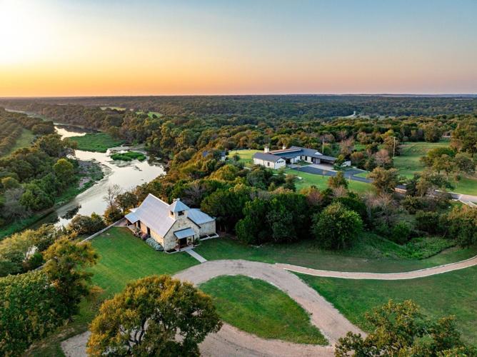 The Brazos River Ranch, a seriously stylish private getaway in the Texas Hill Country, with sleek stone home, unique guesthouses, exotic game, breathtaking vistas and a very famous river running through it. It is represented by the Burgher-Ray Ranch Gro...