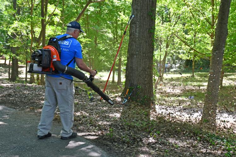 PHOTOS: Hellas Fibers and Beautification Board volunteers spruce up Keebler Park