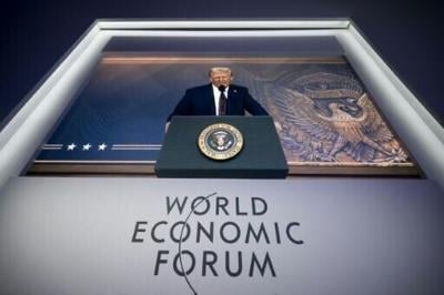 Donald Trump addressing last year's World Economic Forum in Davos via a giant video screen