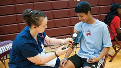 Russell Medical, CACC partnership helps city schools