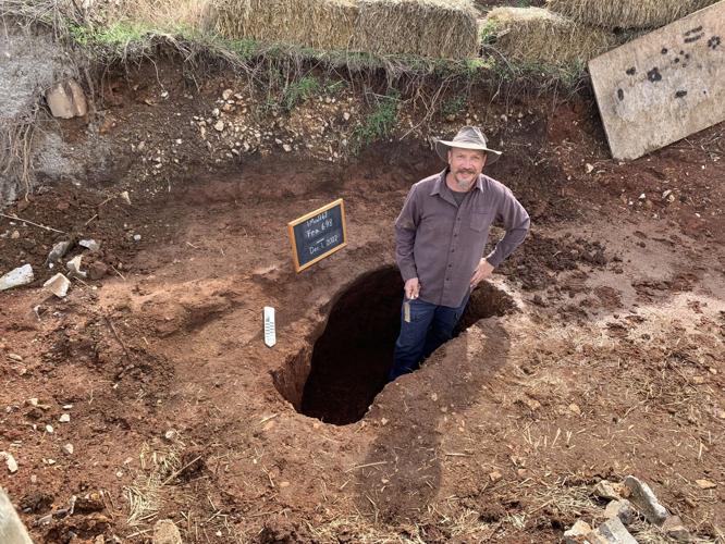 Ben Hoksbergen excavating a Woodland Period storage pit on an ancient village site on Redstone Arsenal..JPG